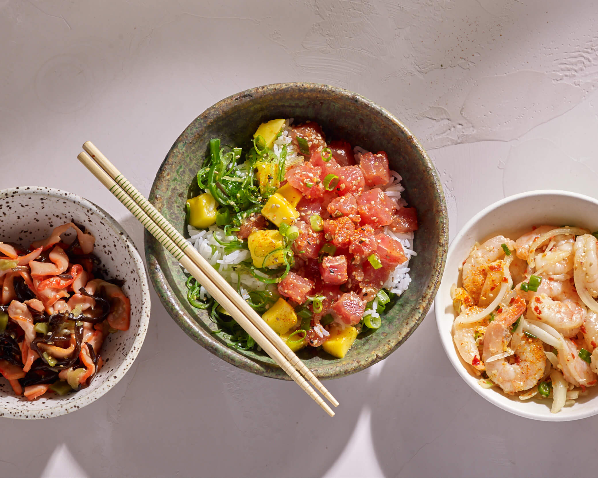 Three bowls of Poke
