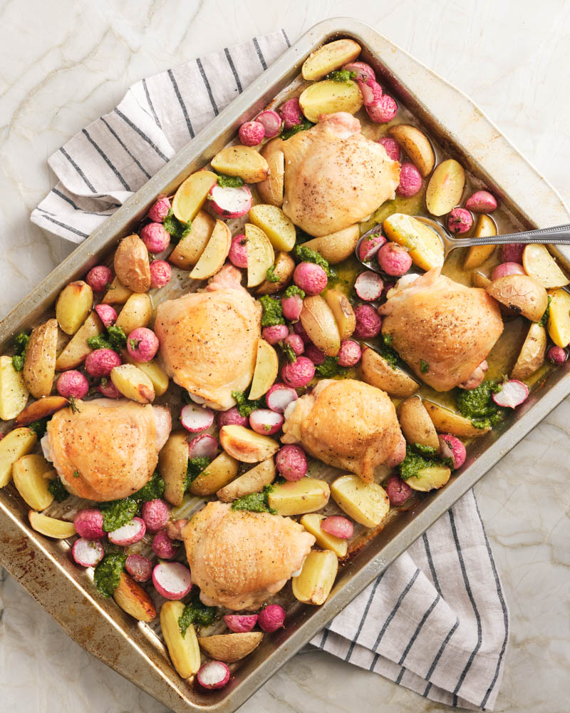 4 ingredient sheet pan chicken with pesto and schmaltzy radishes