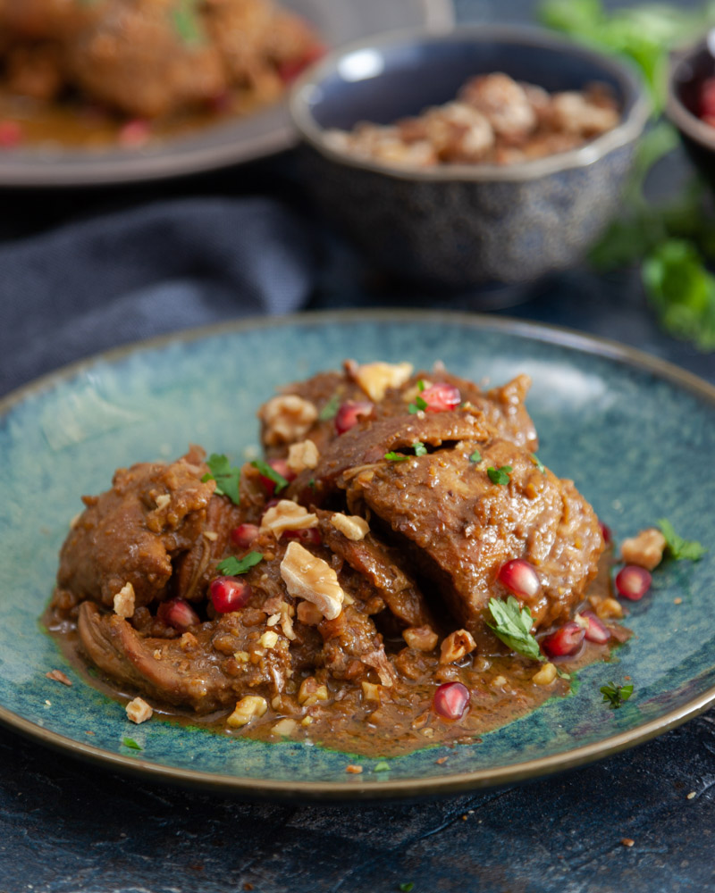 fesenjan (persian pomegranate and walnut chicken)