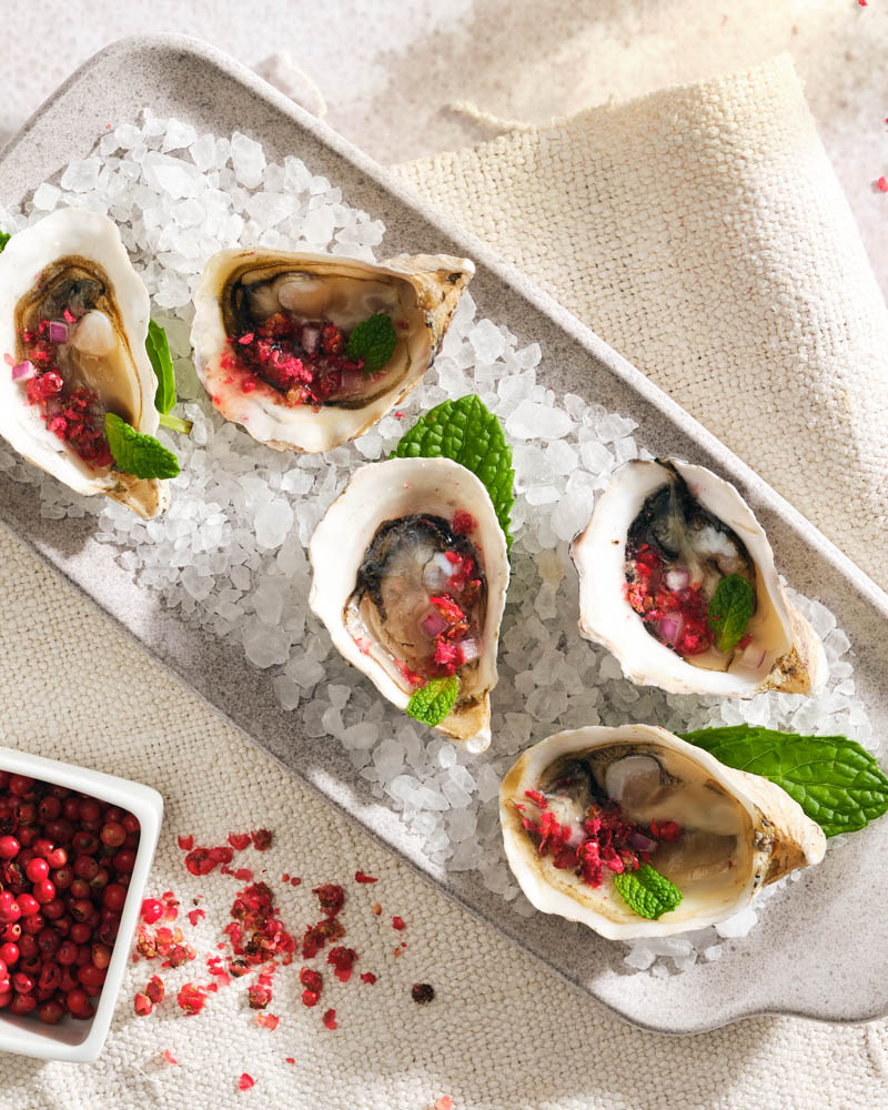 oysters with pink peppercorn raspberry mignonette