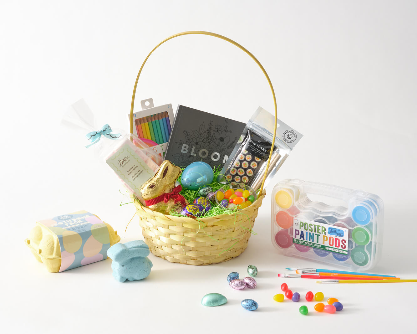 easter basket for young adults with candy and coloring supplies and bath bombs