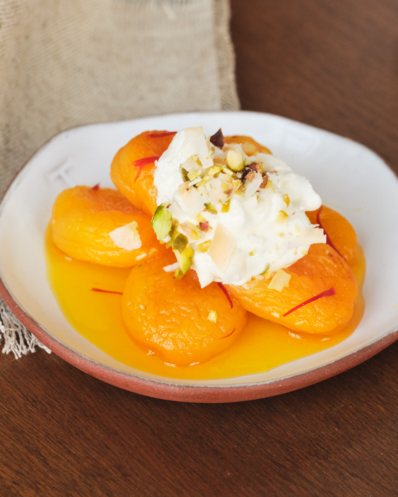 apricots with saffron, yogurt cream, and pistachios