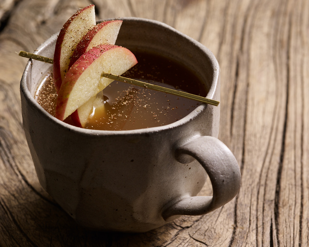 Hot toddy with apple skewer