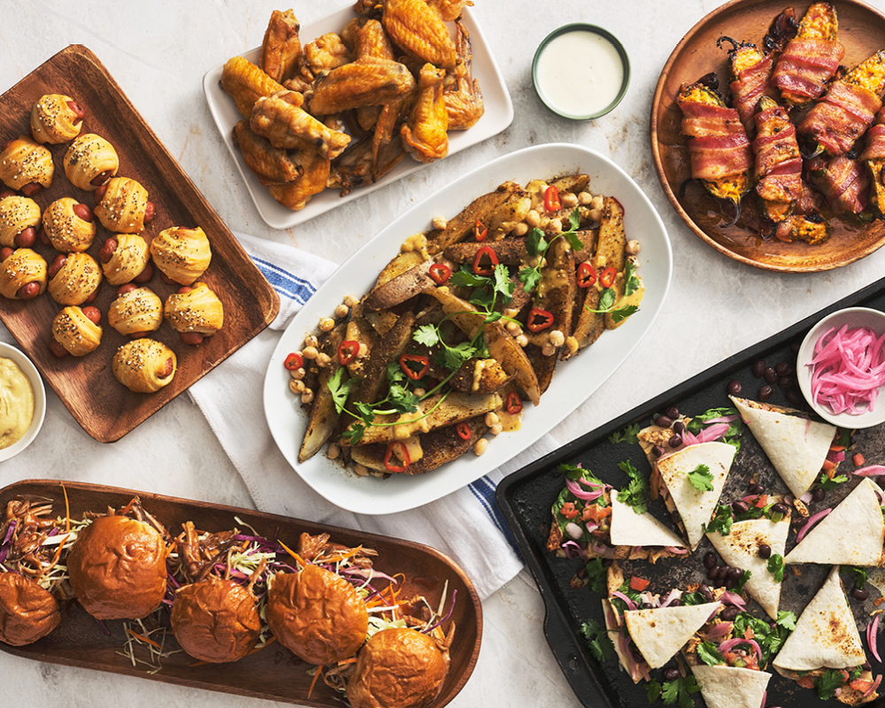 Assortment of Game Ready Bites Pigs in a Blanket, Sliders, Quesadillas