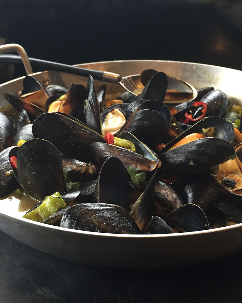 mussels in curry coconut broth
