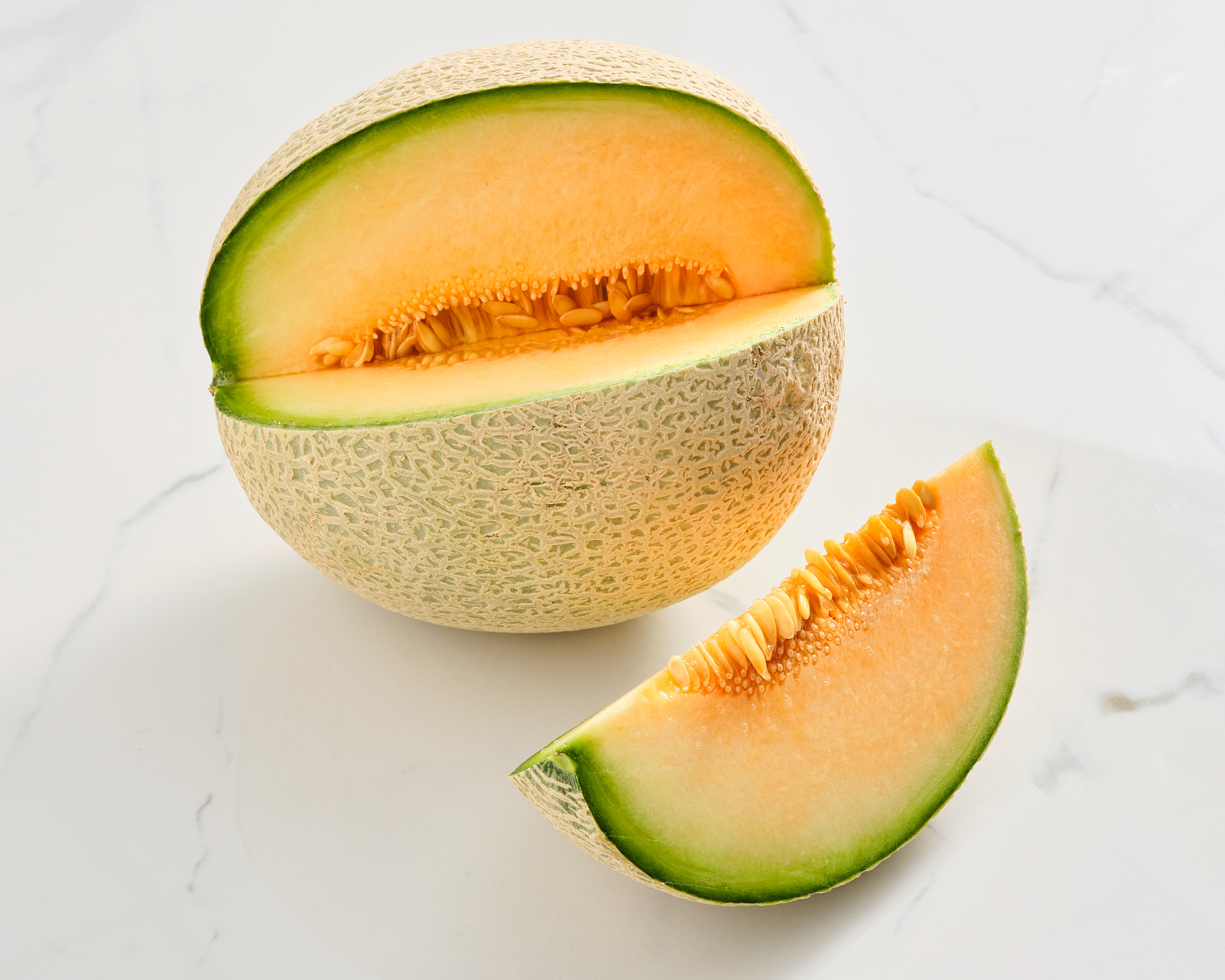 Cantaloupe with cut wedge