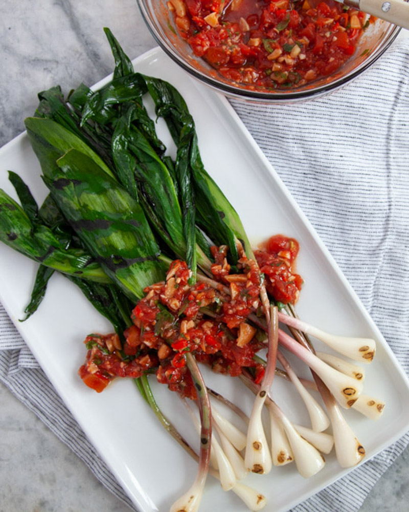 grilled ramps with salbitxada (tomato and almond sauce)