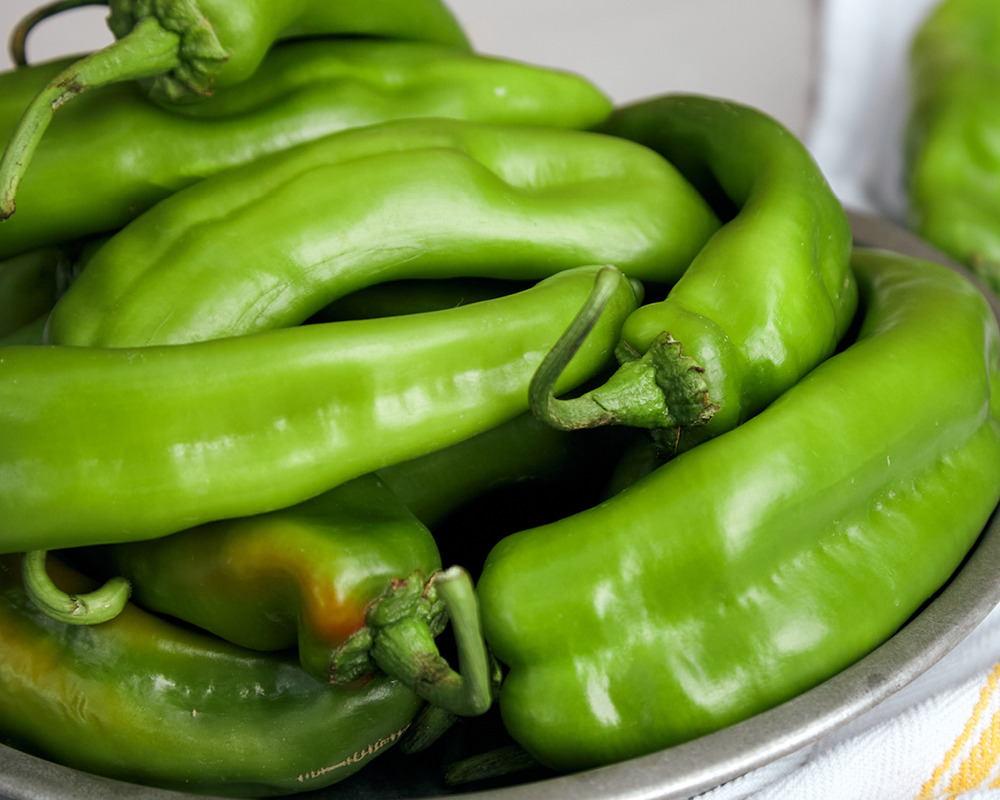 A pile of green hatch chiles