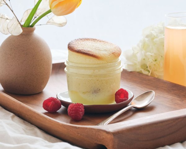 Raspberry custard on a tray with flowers
