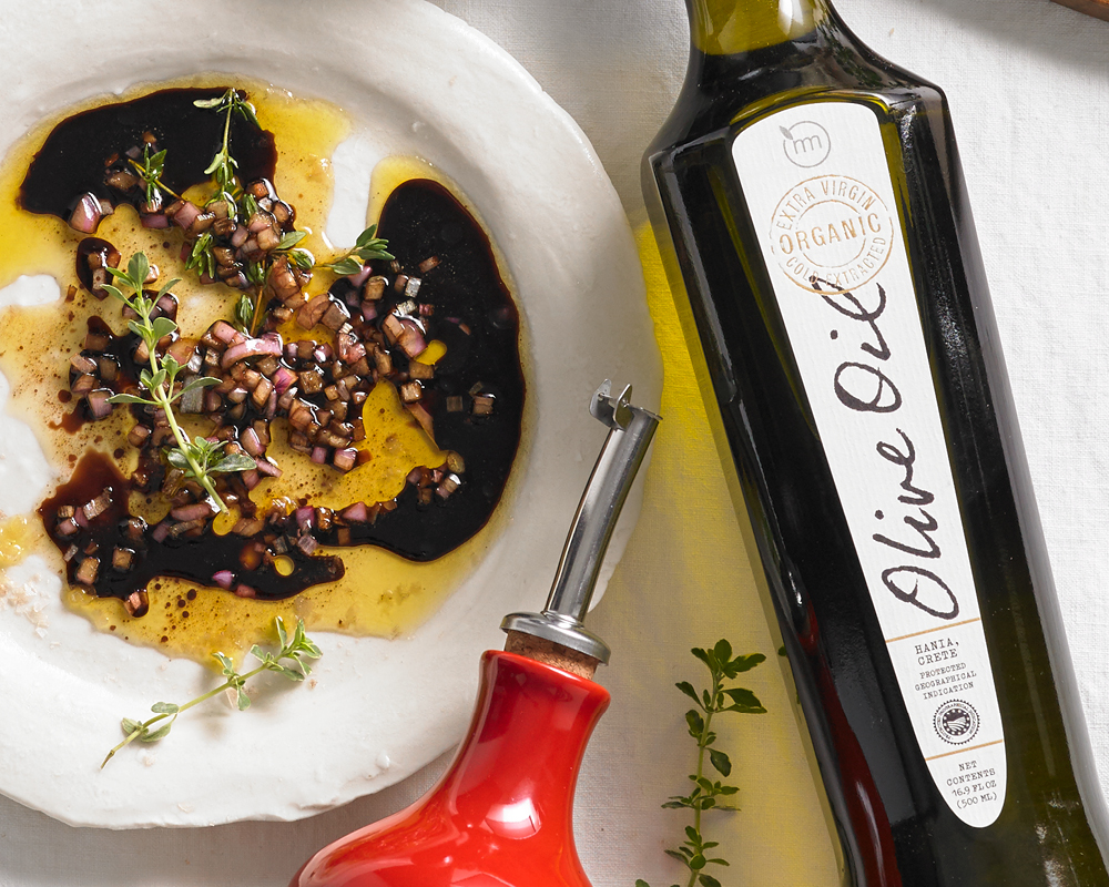 Olive oil bottle with oil and vinegar mixture