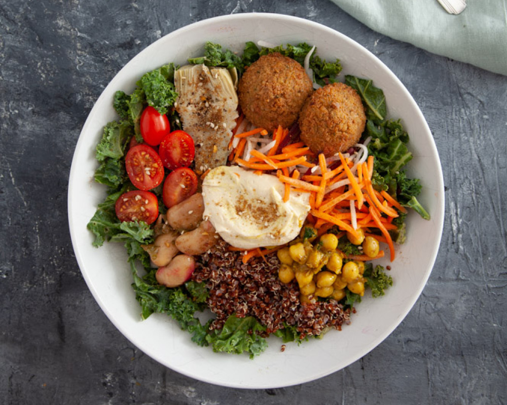 Plant-based power bowl on gray background
