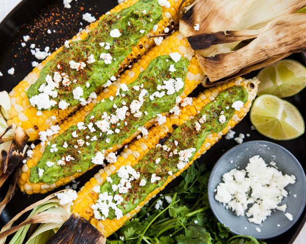 Grilled corn with avocado salsa and cotjia