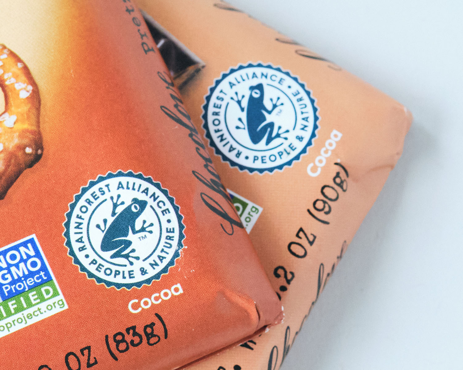 Close up image showing  Rainforest Alliance logo on food packages.