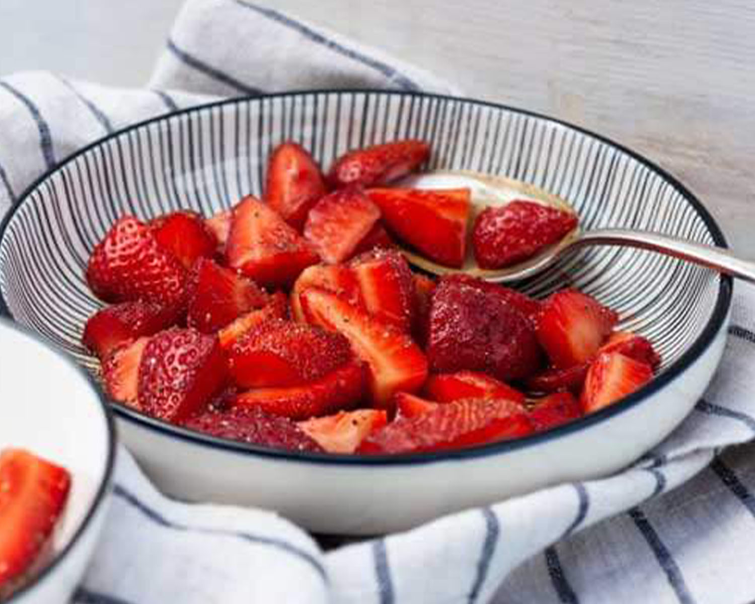 bowl of sliced strawberries