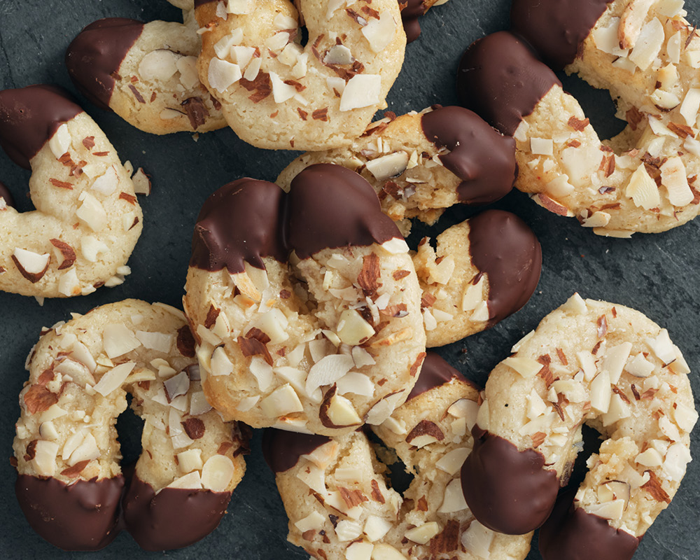 Mandelhornchen arranged on a slate serving platter