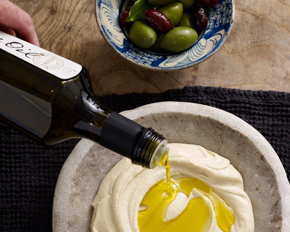 Extra virgin olive oil in hummus
